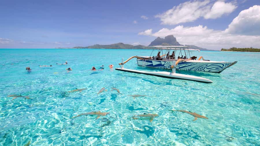 Bora Bora: Lagoon Tour and Snorkeling Experience - Setting out by motorized outrigger