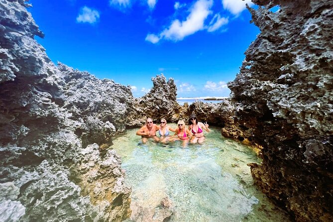 REEF ISLAND | private island | pink sand | natural swimming pools - Reef Island’s black rock and pink sand