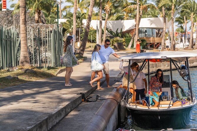 Tahiti Lagoon Snorkeling and Lunch Boat Tour (6 pax max) - Leaving Papeete with Tahiti in view
