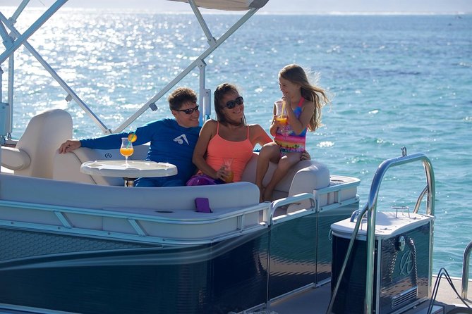 Toa Boat Bora Bora Private Lagoon tour On Majestic Pontoon Boat - Snorkeling among fish, rays, sharks, and coral